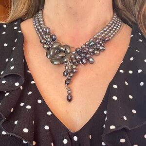 Elegant Pearl Necklace with Floral Accent
